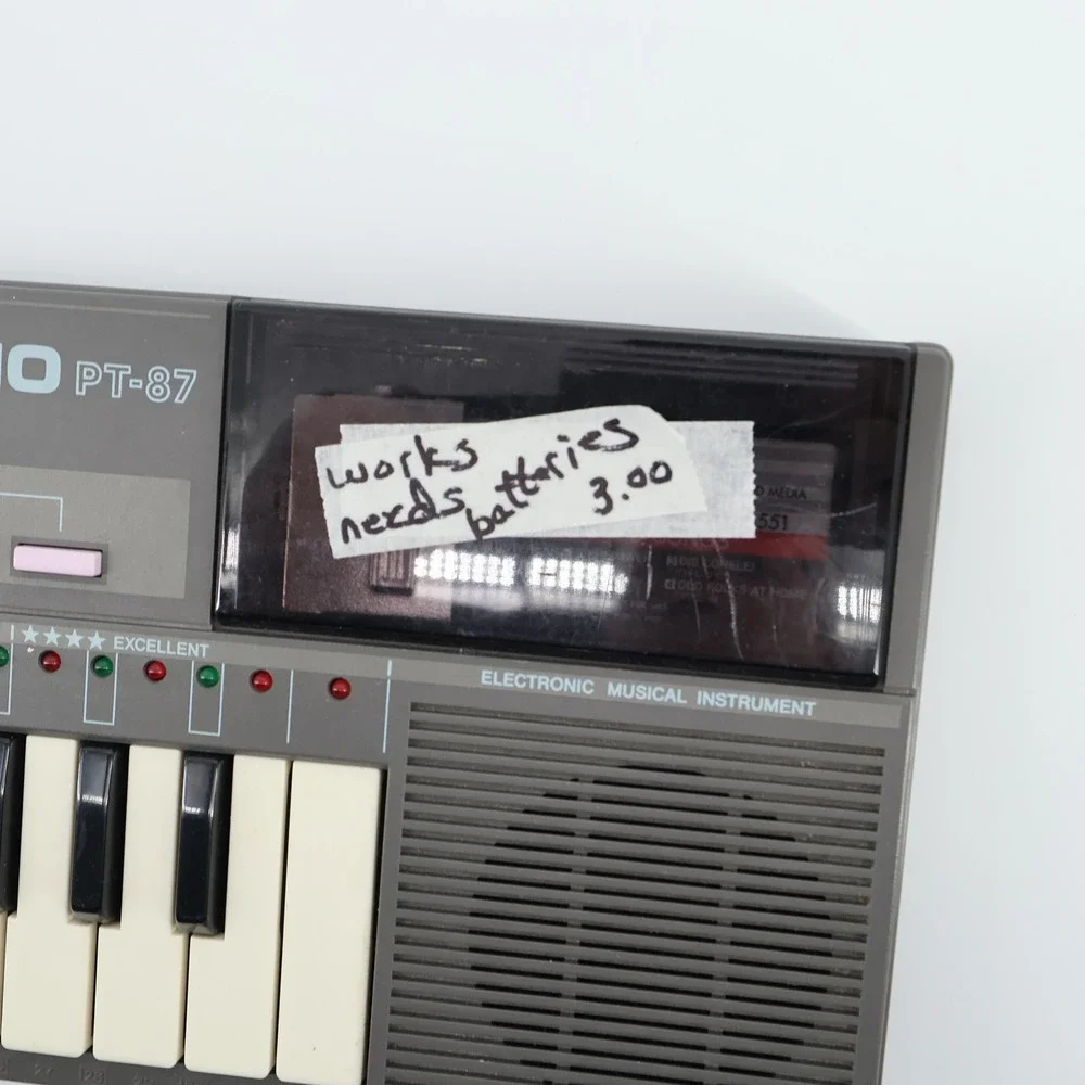Vintage Casio PT-87 Mini Keyboard & ROM Pack RO-551 World Songs TESTED & WORKING